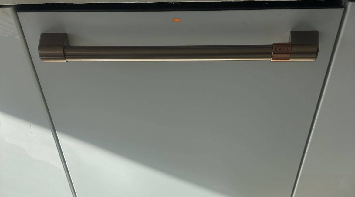 Dishwasher not draining fully and leaving standing water — possible pump or filter blockage PWS 3